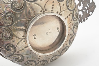 Lot 152 - A pair of late Victorian silver two-handled dishes.