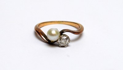 Lot 193 - A diamond and pearl ring