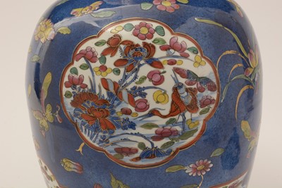 Lot 875 - Clobbered Chinese blue and white vase.
