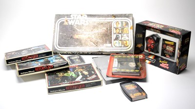 Lot 215 - A selection of Star Wars games and puzzles.