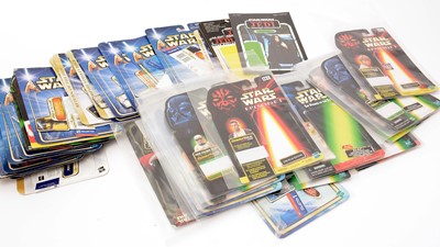 Lot 283 - Star Wars: a large quantity of action figures; and figurine card backs.