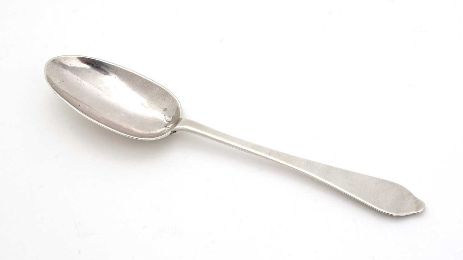Lot 27 - A Queen Anne silver wavy-end or dog-nose tablespoon.