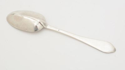 Lot 27 - A Queen Anne silver wavy-end or dog-nose tablespoon.