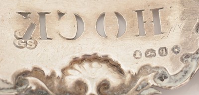 Lot 228 - A set of three William IV silver wine labels.