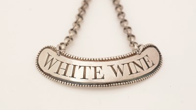 Lot 235 - A George III silver wine label.