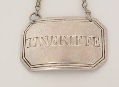 Lot 231 - A George III silver wine label; and another.