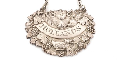 Lot 247 - A George IV silver wine label.