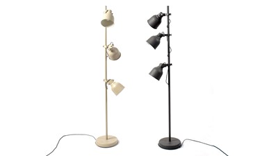 Lot 114 - A pair of contemporary floor standing/ three point spot lamps