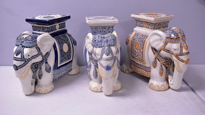 Lot 425 - Three Chinese elephant stools, in various shades.