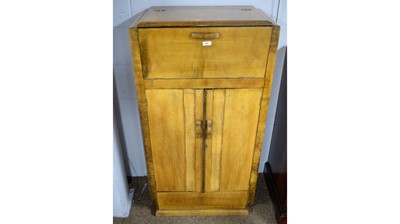 Lot 102 - A 1930's walnut cocktail cabinet.