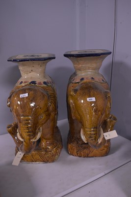 Lot 422 - A pair of Chinese elephant stools.