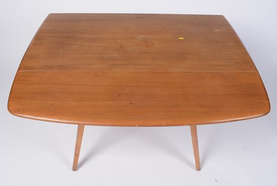 Lot 72 - Lucian Ercolani for Ercol furniture - a beech and elm dining table and four no 369 dining chairs