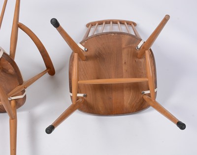 Lot 72 - Lucian Ercolani for Ercol furniture - a beech and elm dining table and four no 369 dining chairs