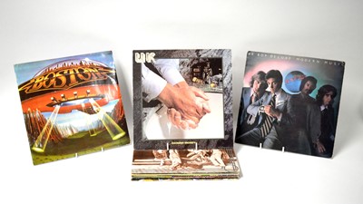Lot 310 - A selection of mixed rock LPs.
