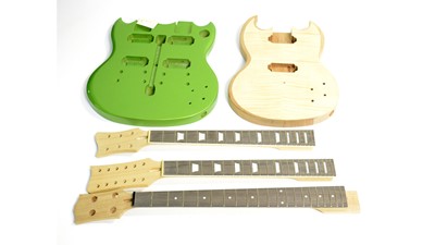 Lot 598 - Three unfinished guitar necks and two guitar bodies