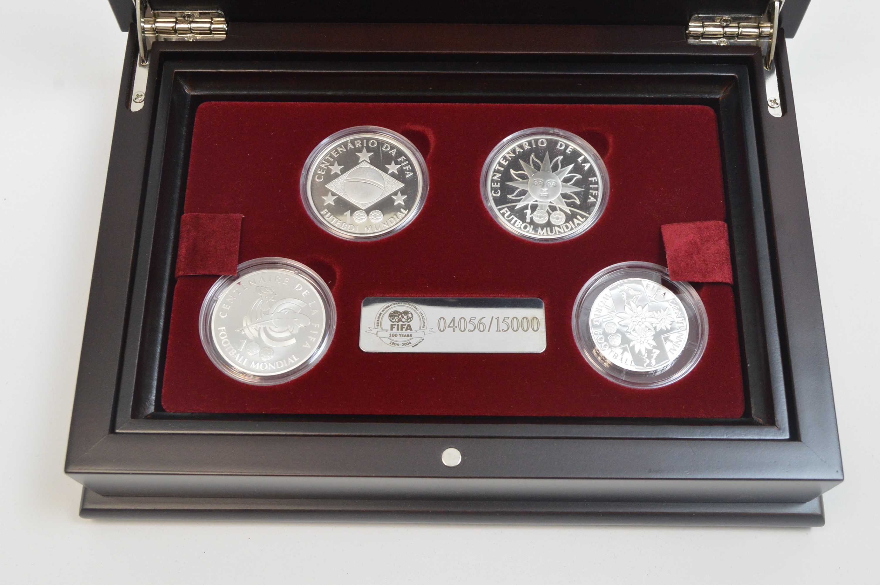 Lot 824 - FIFA 100 Years Anniversary silver 4-coin set.