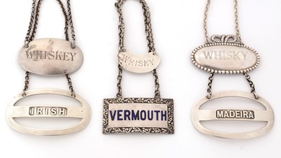 Lot 273 - Six various silver wine labels.