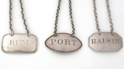 Lot 269 - Three silver wine labels, various styles and makers.