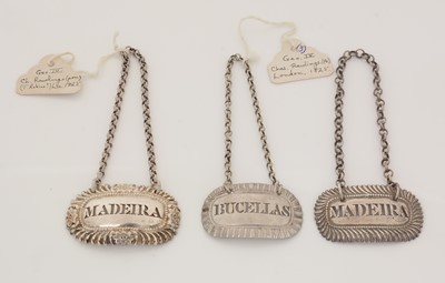 Lot 232 - Three George IV silver wine labels, various.