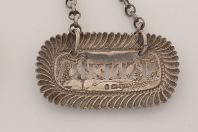 Lot 232 - Three George IV silver wine labels, various.