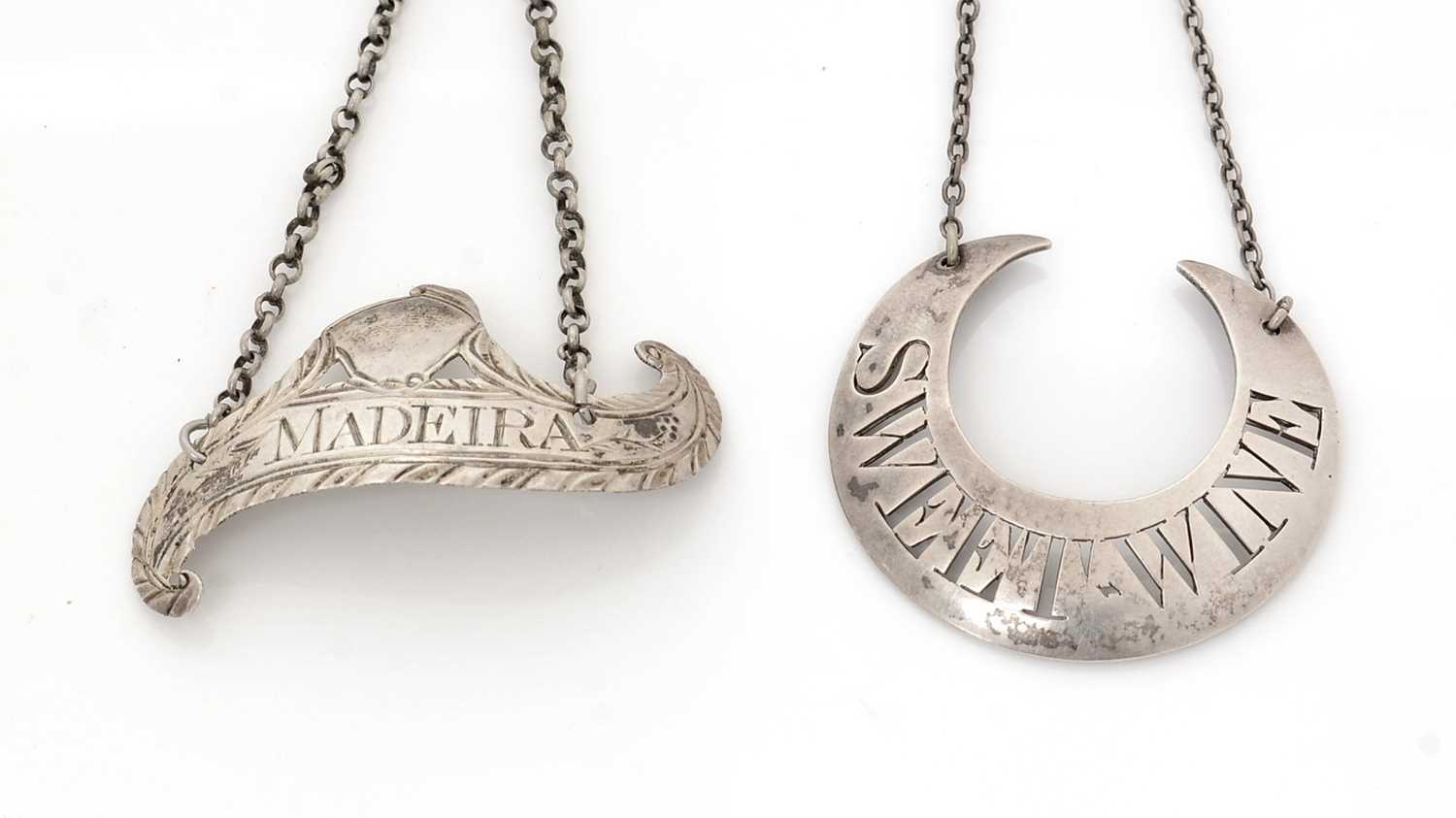 Lot 274 - Two silver wine labels, various designs and makers.