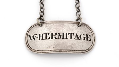 Lot 255 - An early George IV silver wine label.