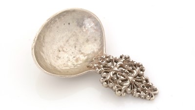 Lot 33 - A George V Arts & Crafts silver caddy spoon.