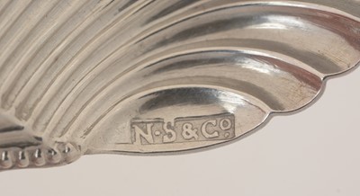 Lot 40 - A George III silver Provincial caddy spoon.