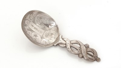 Lot 50 - A Victorian silver engraved caddy spoon.