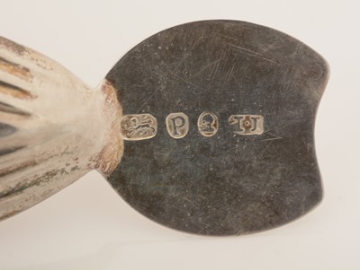 Lot 63 - A George III silver caddy spoon; and another caddy spoon.