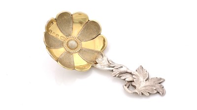 Lot 66 - A Victorian parcel-gilt caddy spoon.