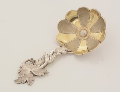 Lot 66 - A Victorian parcel-gilt caddy spoon.