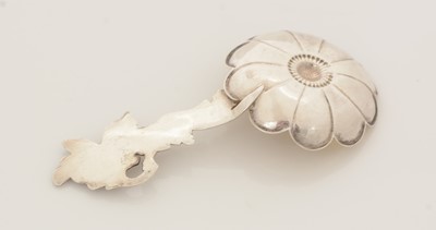 Lot 66 - A Victorian parcel-gilt caddy spoon.