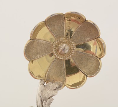 Lot 66 - A Victorian parcel-gilt caddy spoon.