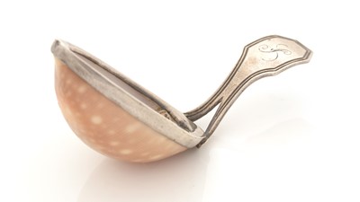 Lot 68 - A George III silver-mounted natural shell caddy spoon.