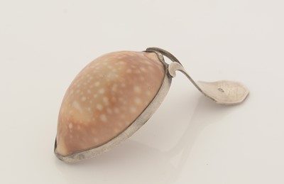 Lot 68 - A George III silver-mounted natural shell caddy spoon.