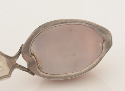 Lot 68 - A George III silver-mounted natural shell caddy spoon.