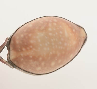 Lot 68 - A George III silver-mounted natural shell caddy spoon.
