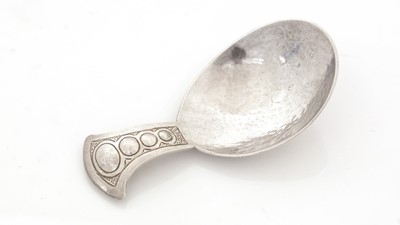 Lot 75 - A late Victorian silver Arts & Crafts caddy spoon.