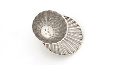 Lot 76 - A George III silver "jockey cap" caddy spoon.