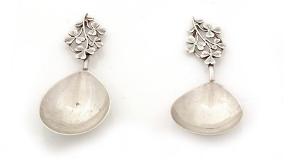 Lot 93 - A matched pair of two very similar silver caddy spoons.