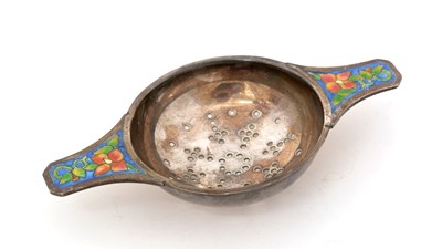 Lot 219 - A George V silver tea strainer.