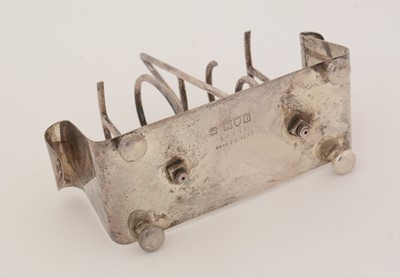 Lot 215 - A late Victorian novelty silver toast rack.