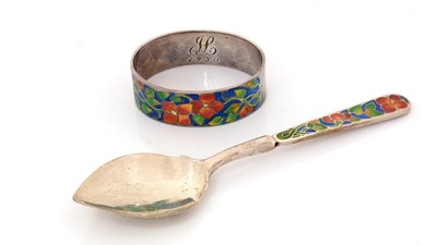 Lot 211 - A George V silver napkin ring and spoon.
