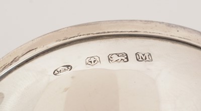 Lot 217 - A pair of Edward VIII silver Art Deco nut dishes.
