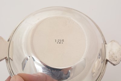 Lot 217 - A pair of Edward VIII silver Art Deco nut dishes.