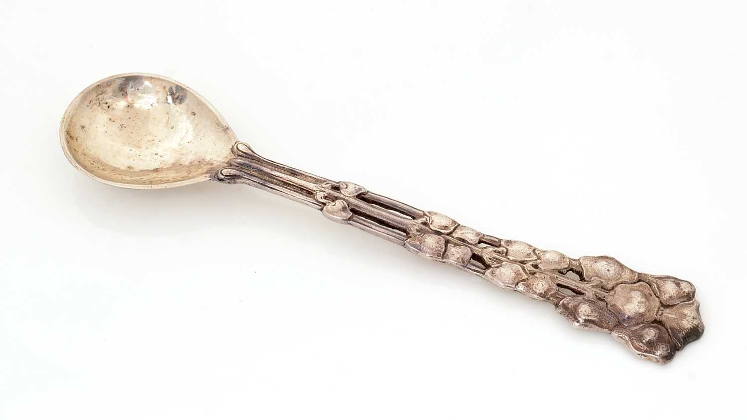 Lot 213 - A George V silver cast spoon.