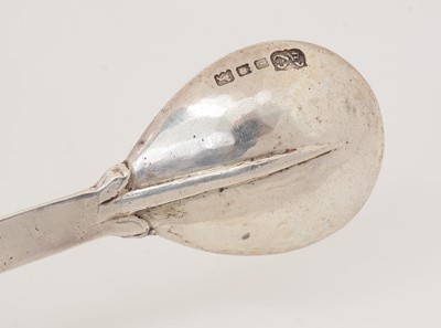 Lot 213 - A George V silver cast spoon.