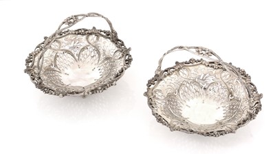 Lot 174 - A pair of late Victorian silver bonbon dishes.
