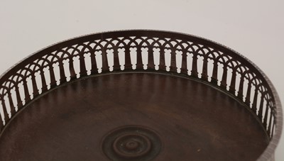 Lot 195 - Two similar George III silver-mounted wine coasters.